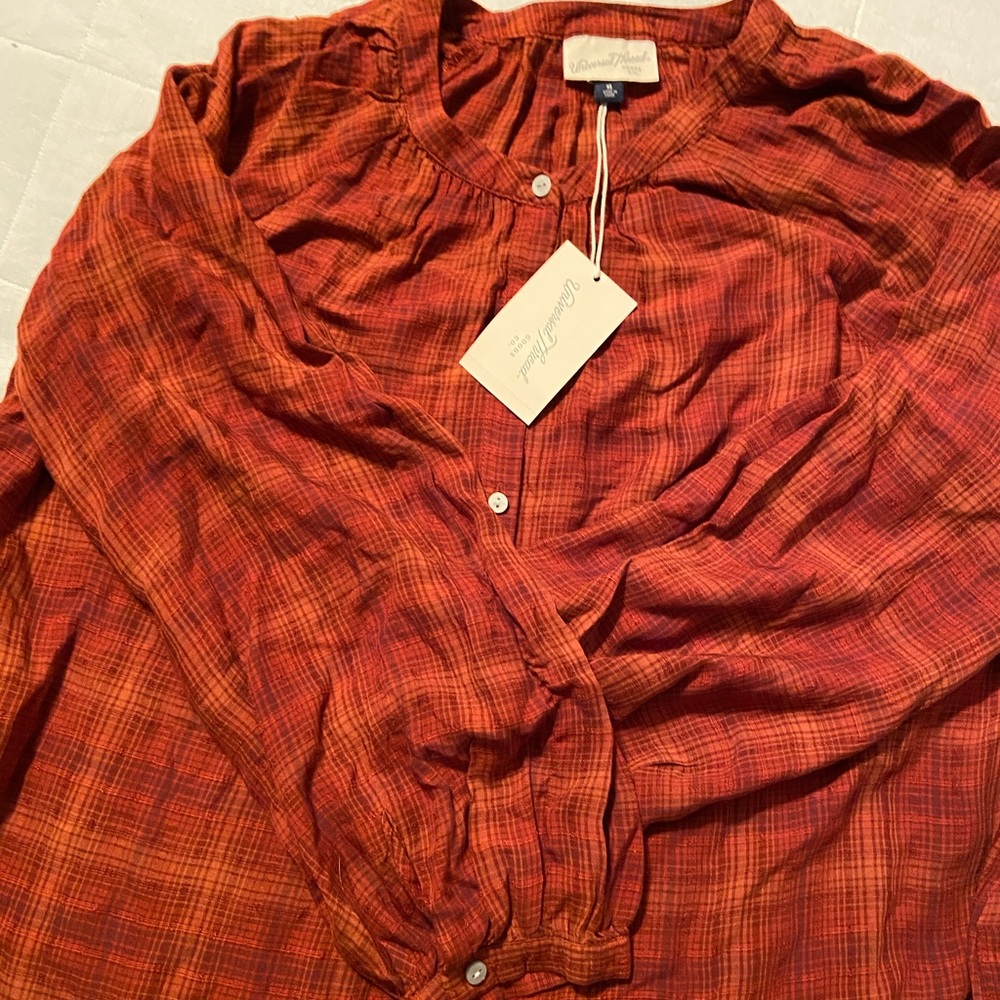 Cooper and red plaid blouse
